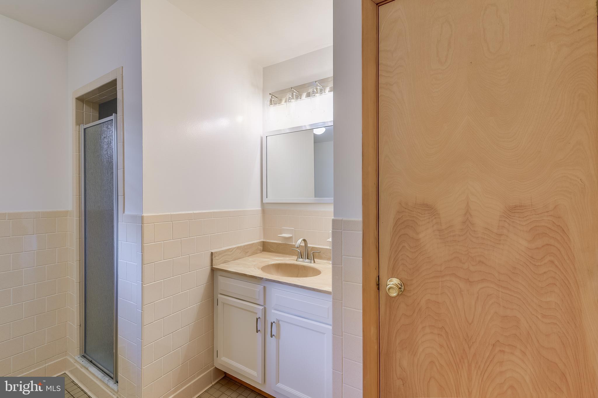 8408 Maryland Road Pasadena, MD 21122 - Photo 29 of 47 Main Level Bath with Linen Closet