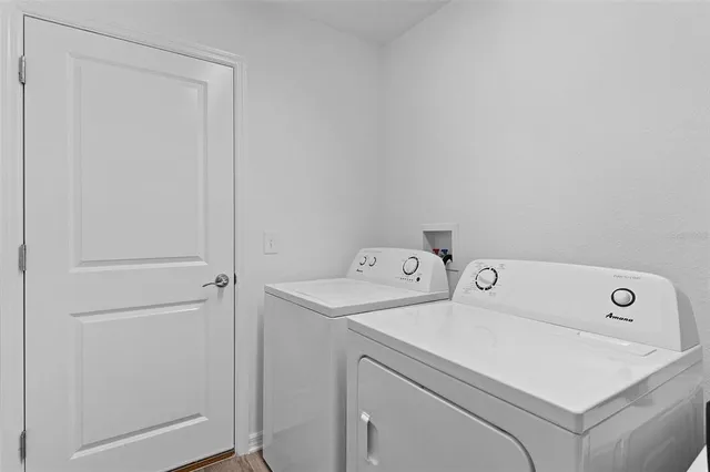 a utility room with dryer and washer