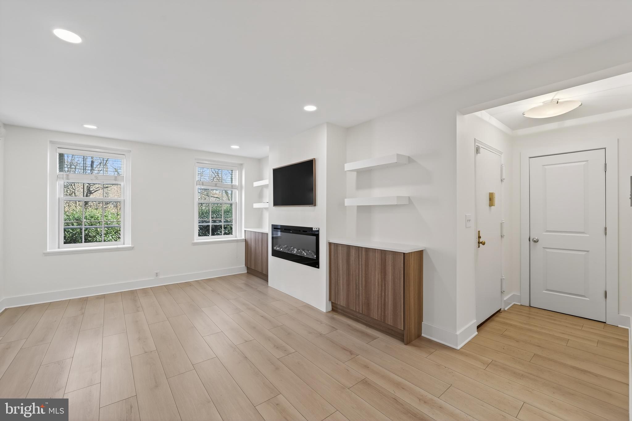 3450 39th Street Northwest, Unit A685 Washington, DC 20016 - Photo 24 of 30 a view of a kitchen with furniture and wooden floor