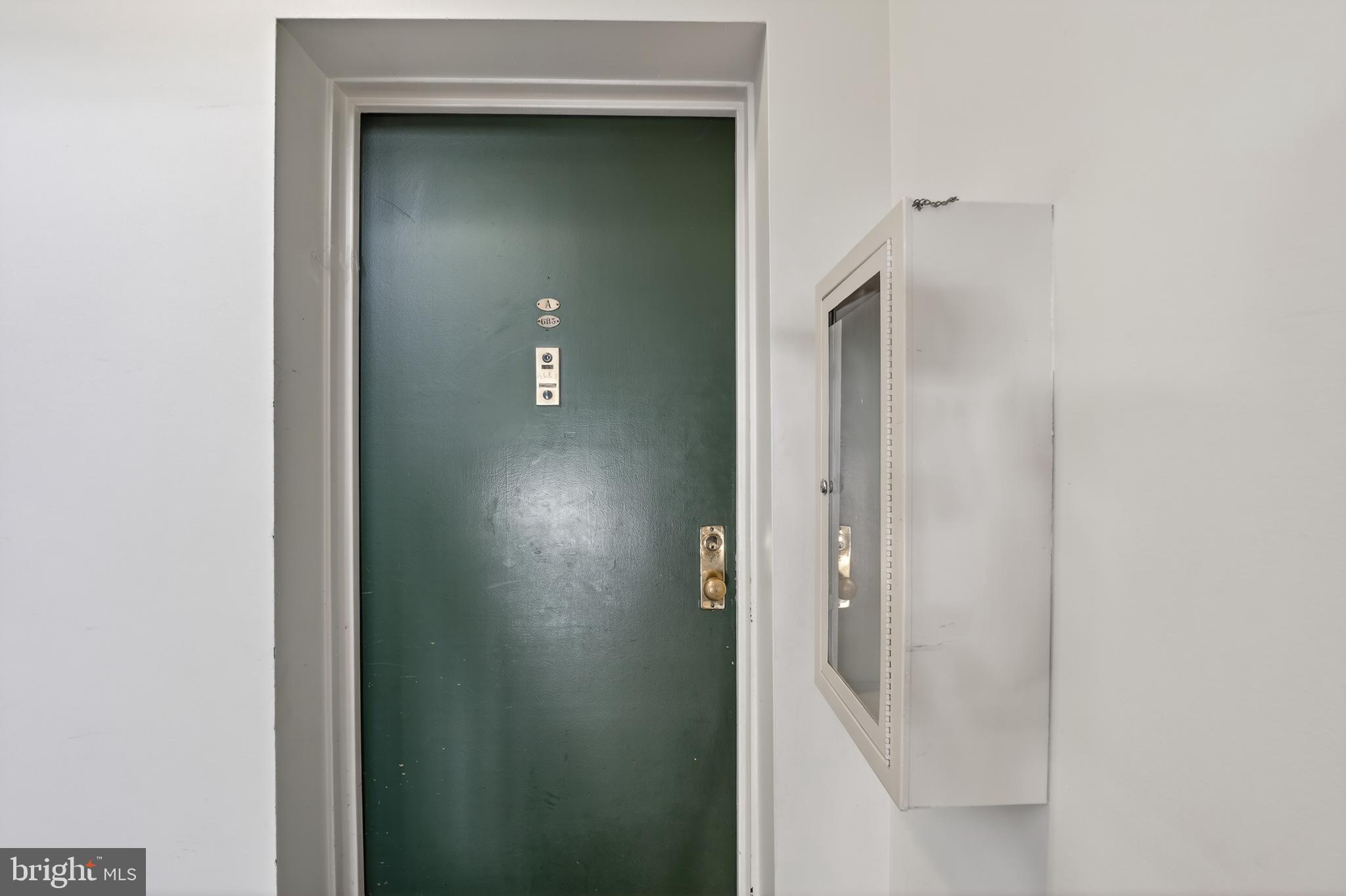 3450 39th Street Northwest, Unit A685 Washington, DC 20016 - Photo 28 of 30 a view of a hallway with wooden floor