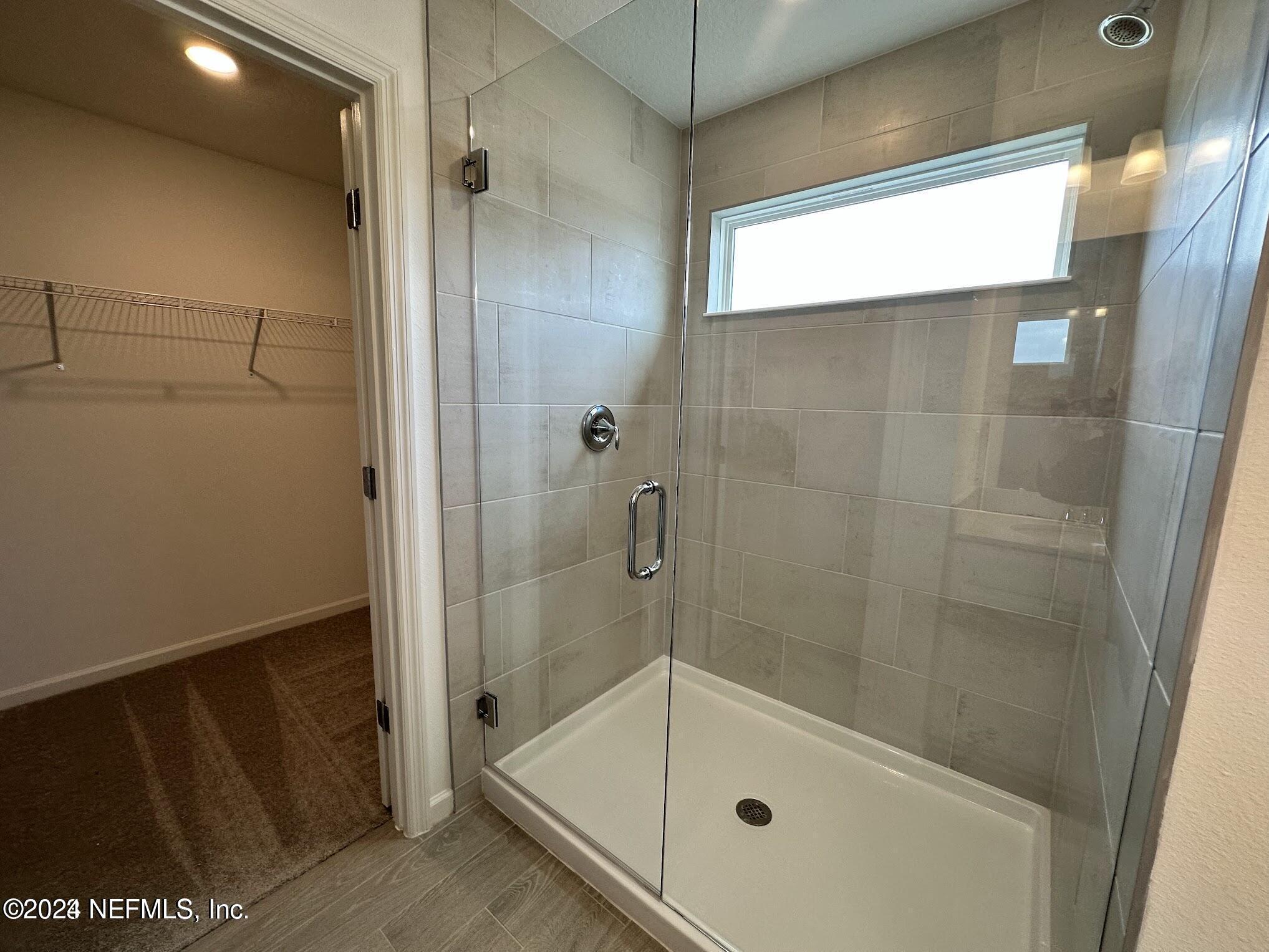 47 Beauclair Boulevard St. Augustine, FL 32084 - Photo 18 of 37 a bathroom with a shower and a sink