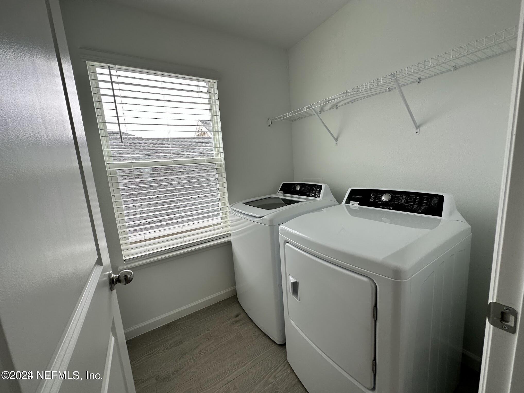 47 Beauclair Boulevard St. Augustine, FL 32084 - Photo 25 of 37 a utility room with dryer and washer