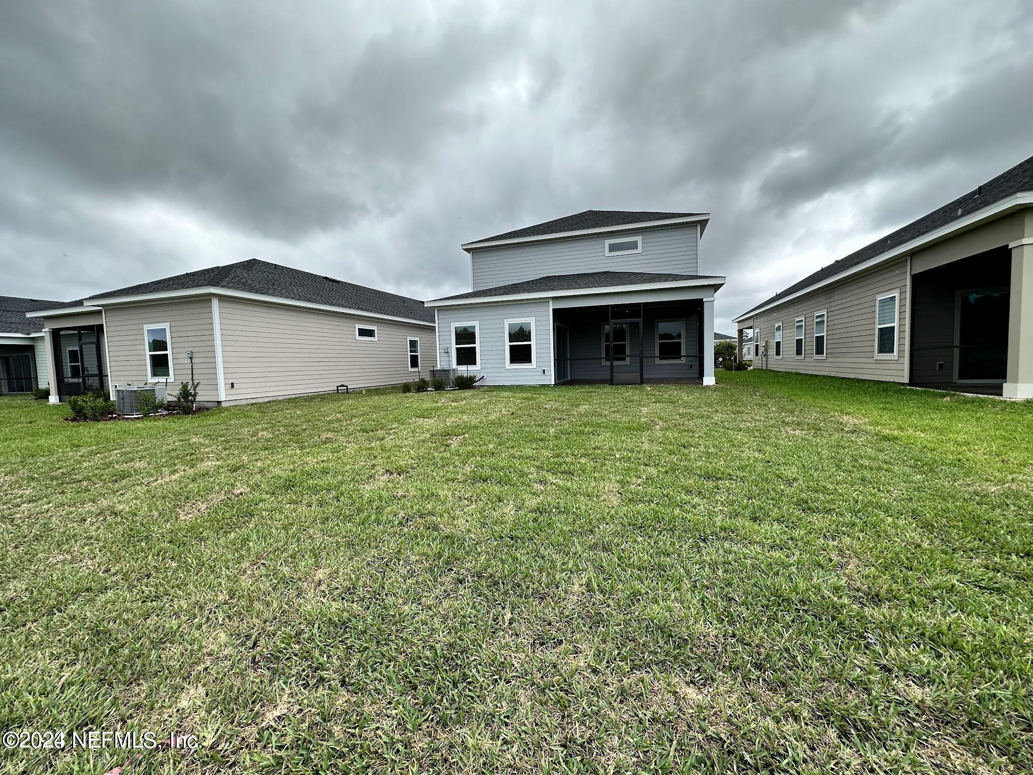 47 Beauclair Boulevard St. Augustine, FL 32084 - Photo 29 of 37 a view of a house with a yard