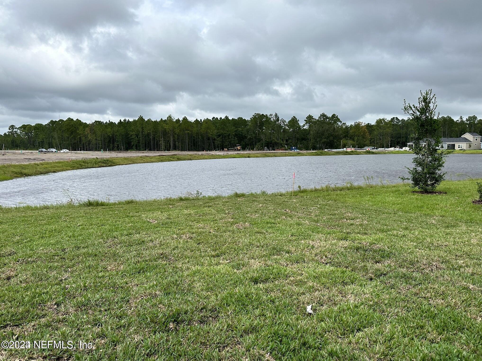 47 Beauclair Boulevard St. Augustine, FL 32084 - Photo 3 of 37 a view of lake and mountain view