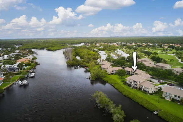 a view of a lake with a yard