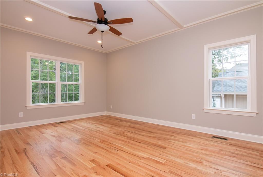6010 Beckenham Way Oak Ridge, NC 27310 - Photo 11 of 25 Spacious master bedroom on main level
