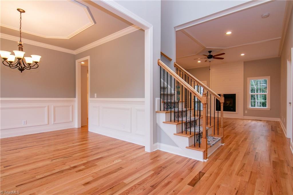6010 Beckenham Way Oak Ridge, NC 27310 - Photo 3 of 25 Gleaming hardwood floors throughout