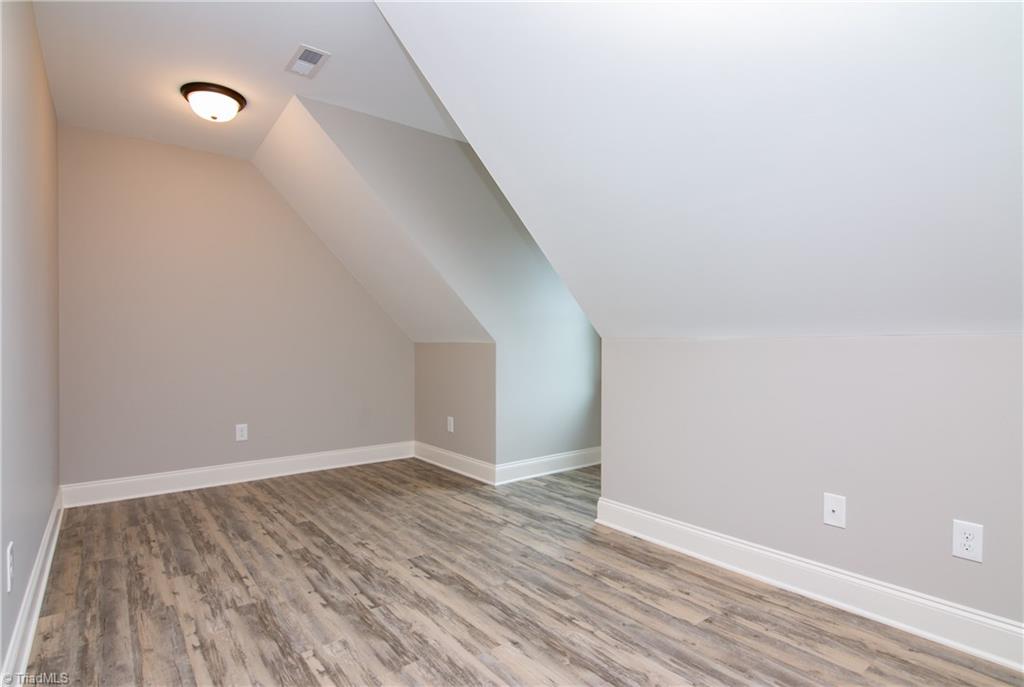 6010 Beckenham Way Oak Ridge, NC 27310 - Photo 21 of 25 Plenty of flexible space in this home
