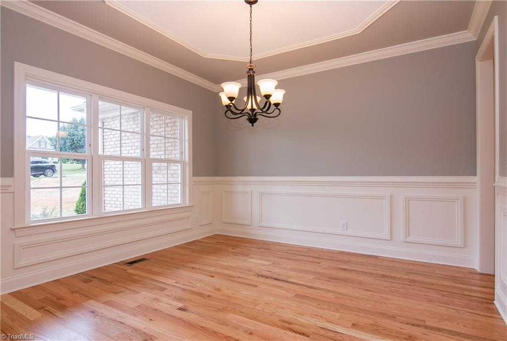6010 Beckenham Way Oak Ridge, NC 27310 - Photo 4 of 25 Gorgeous trim and molding details