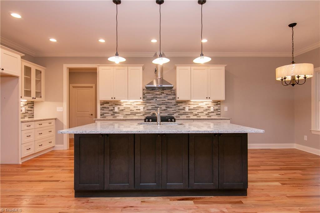 6010 Beckenham Way Oak Ridge, NC 27310 - Photo 8 of 25 Large center island is a place to gather