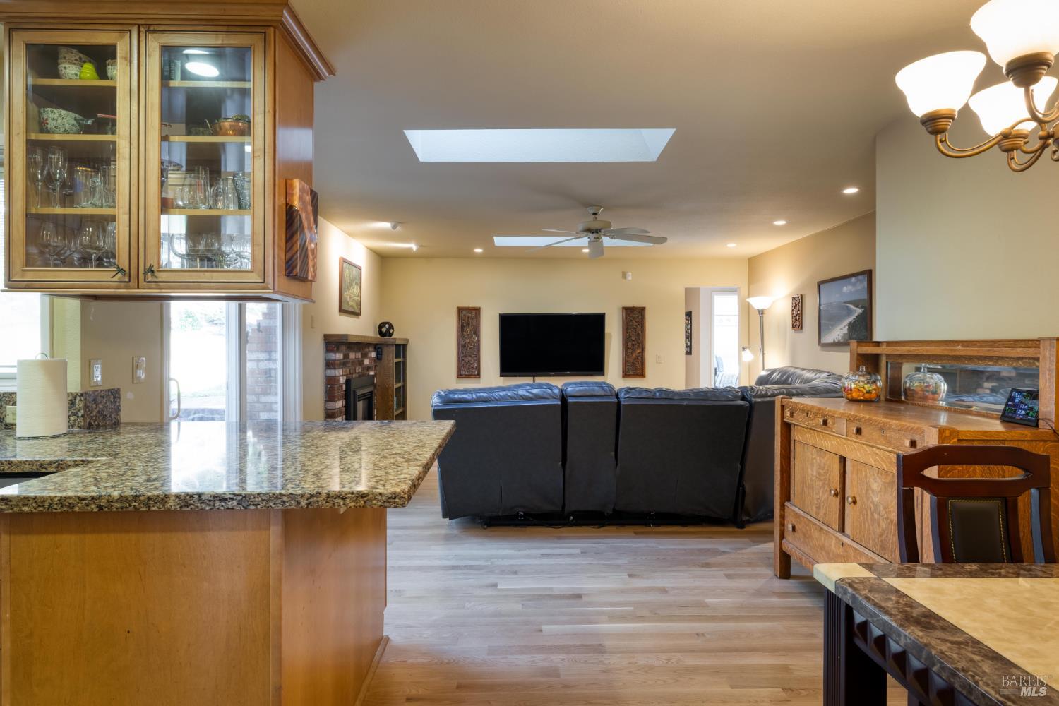 2105 Sunrise Avenue Santa Rosa, CA 95404 - Photo 14 of 30 a kitchen with stainless steel appliances granite countertop a stove and a refrigerator