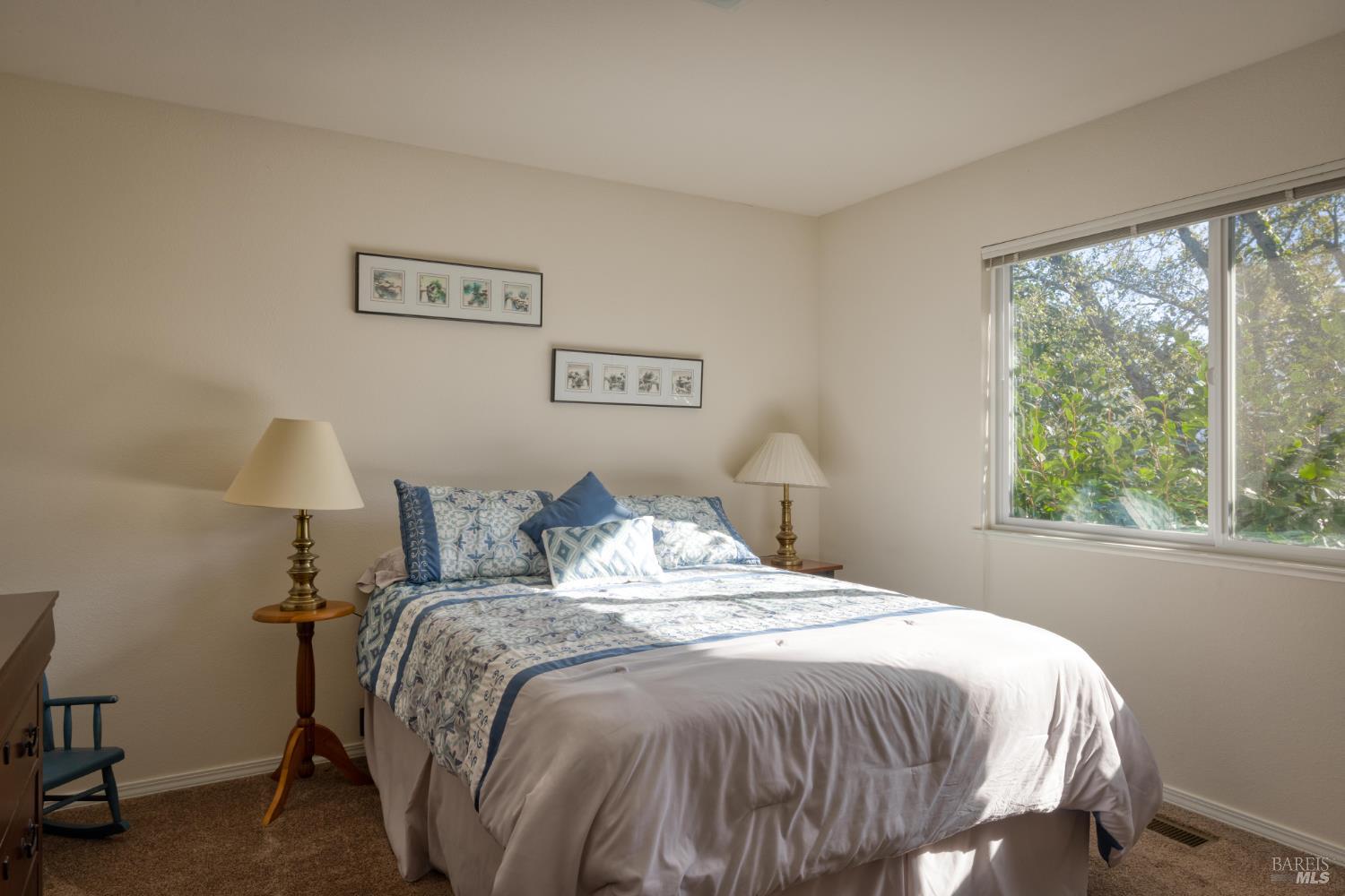 2105 Sunrise Avenue Santa Rosa, CA 95404 - Photo 28 of 30 a bedroom with a bed and a window