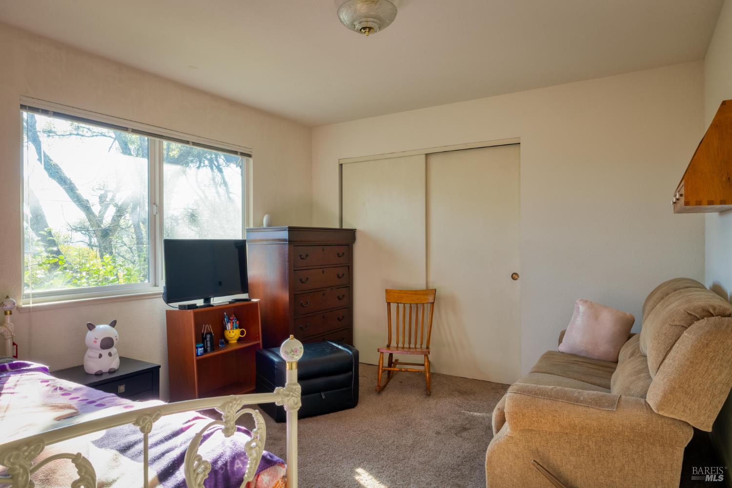 2105 Sunrise Avenue Santa Rosa, CA 95404 - Photo 29 of 30 a bedroom with bed and a window
