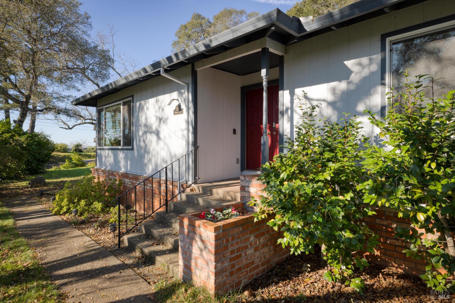 2105 Sunrise Avenue Santa Rosa, CA 95404 - Photo 5 of 30 a front view of a house with garden
