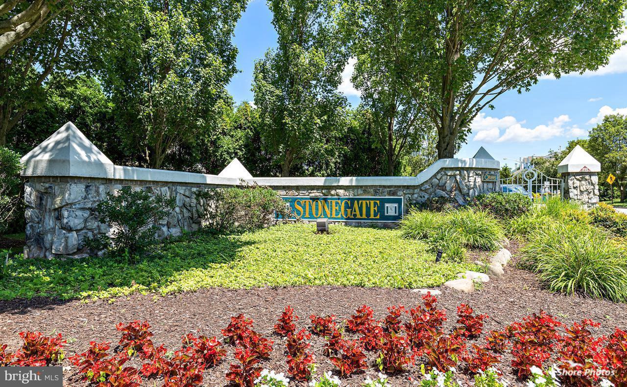 62 Stokes Road Mount Laurel, NJ 08054 - Photo 10 of 10 a backyard of a house with a garden and outdoor seating