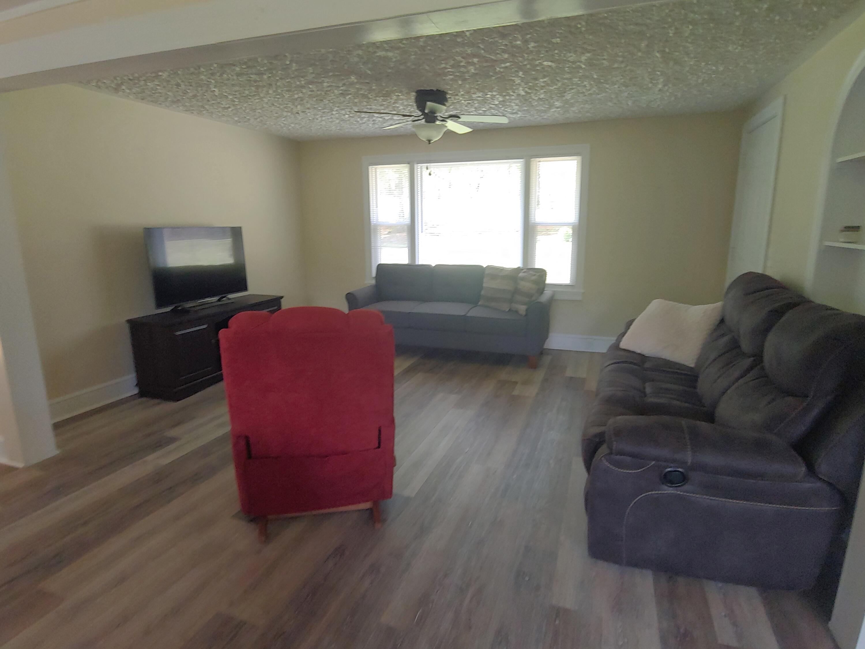 800 King Richard Road Ferrum, VA 24088 - Photo 4 of 17 a living room with furniture window and a wooden floor