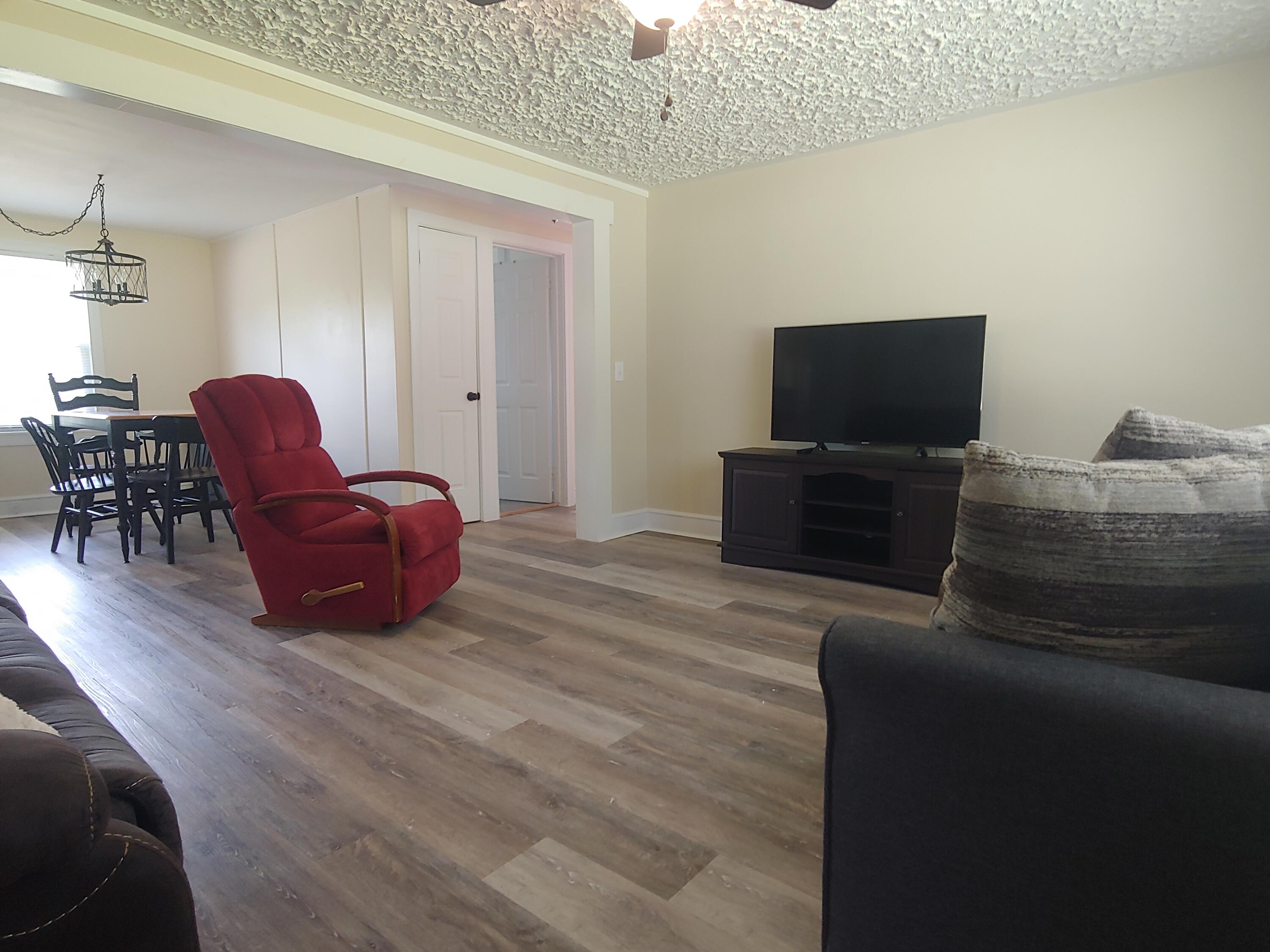 800 King Richard Road Ferrum, VA 24088 - Photo 5 of 17 a living room with furniture and a flat screen tv