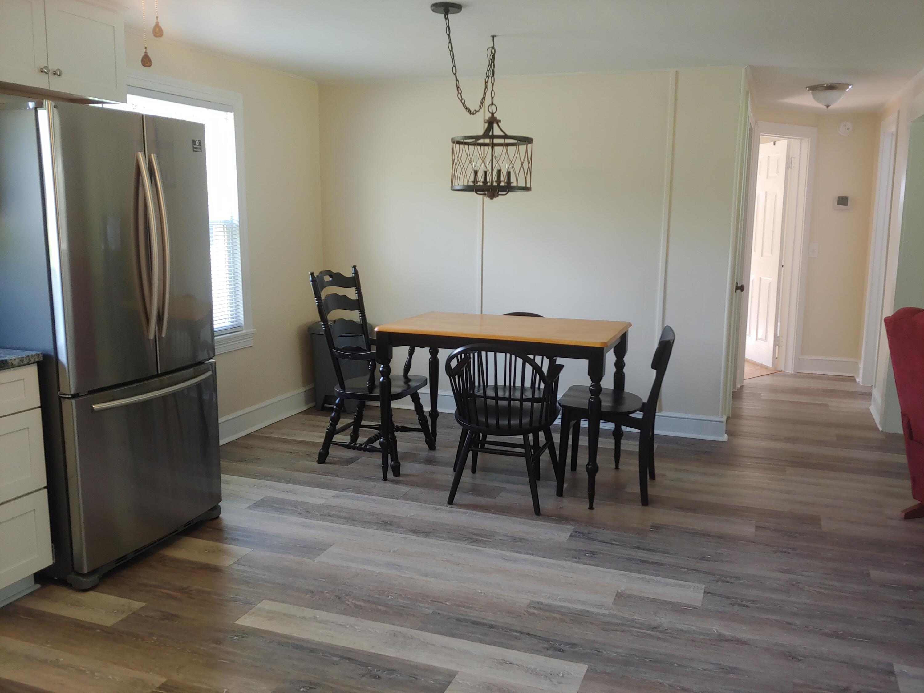 800 King Richard Road Ferrum, VA 24088 - Photo 7 of 17 a view of a dining room with furniture window and wooden floor