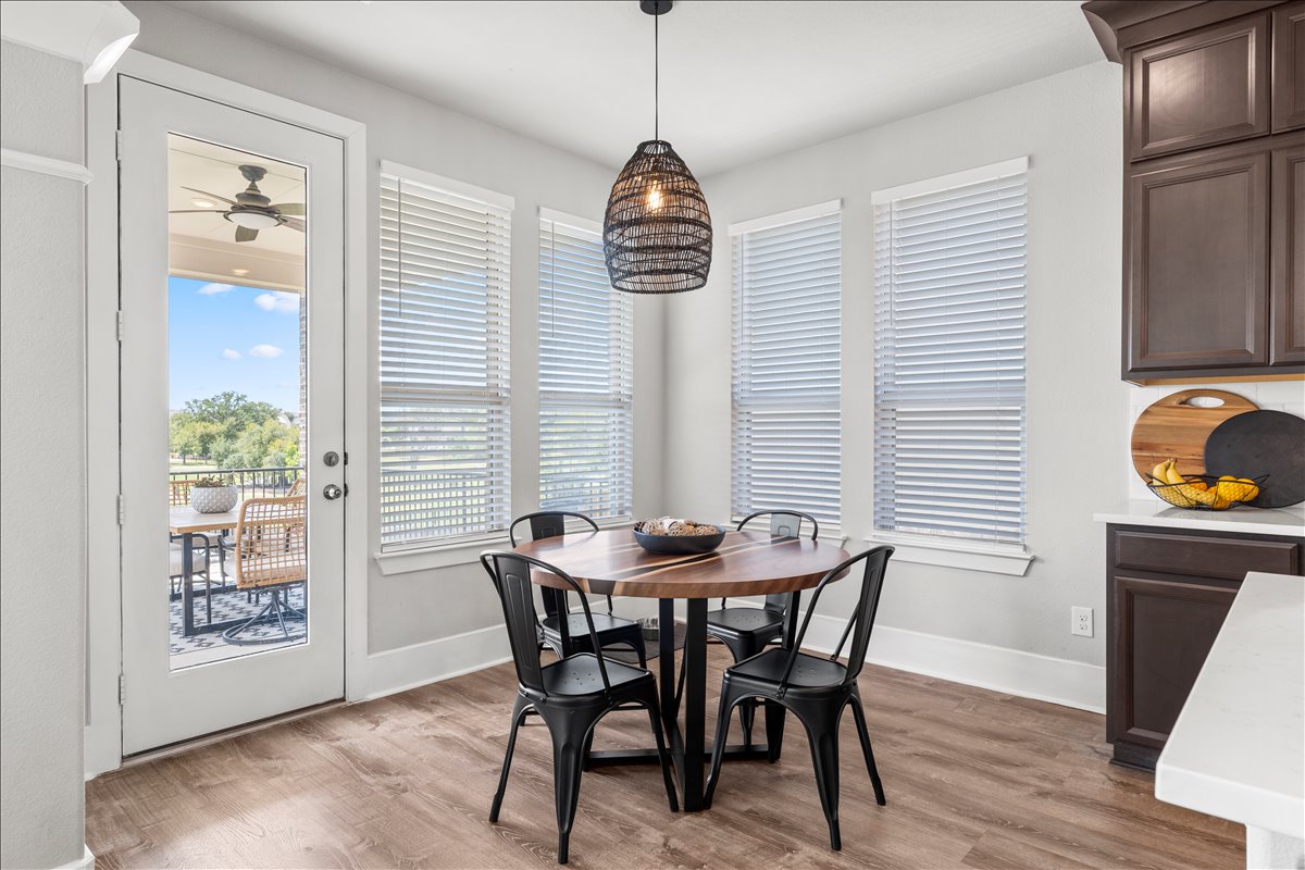 200 Draco Street Georgetown, TX 78628 - Photo 11 of 39 a dining room with furniture and window