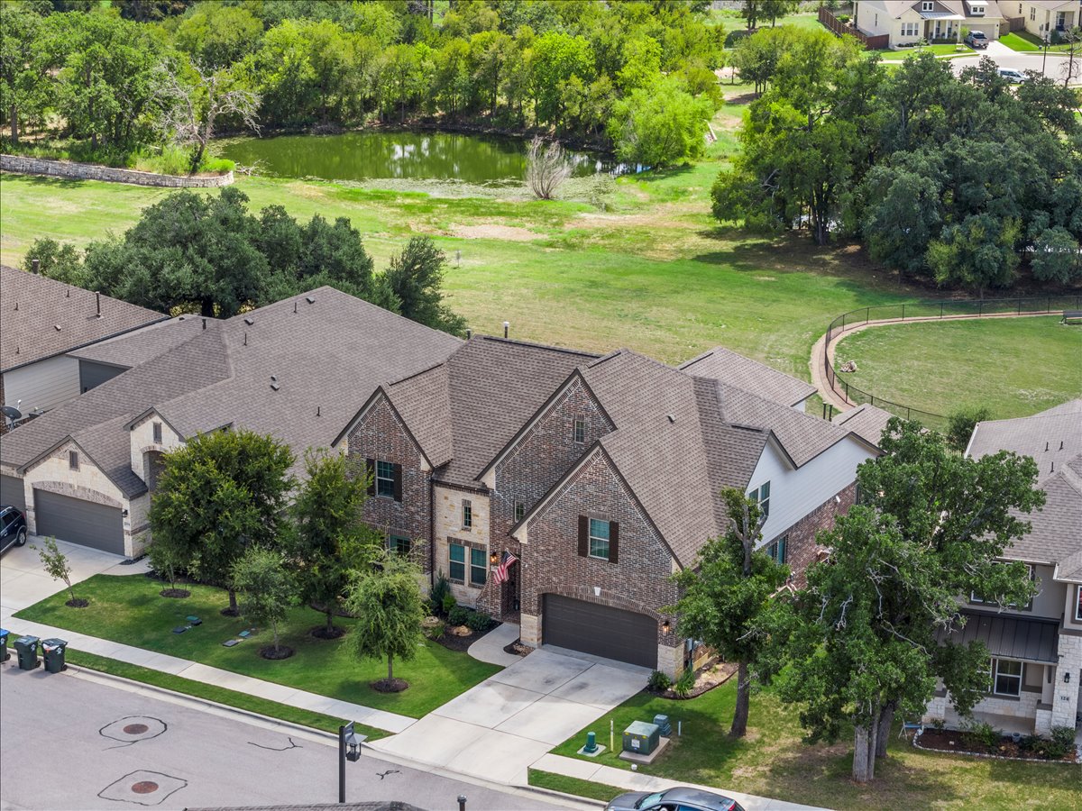 200 Draco Street Georgetown, TX 78628 - Photo 2 of 39 an aerial view of a house with garden space and street view