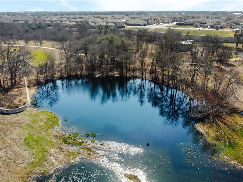 200 Draco Street Georgetown, TX 78628 - Photo 3 of 39 a view of lake with green space
