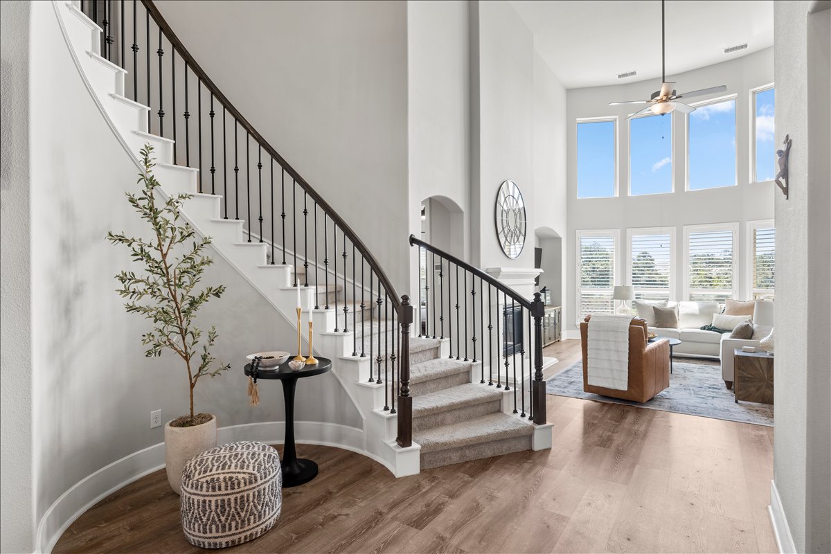 200 Draco Street Georgetown, TX 78628 - Photo 7 of 39 a view of entryway and hall with wooden floor