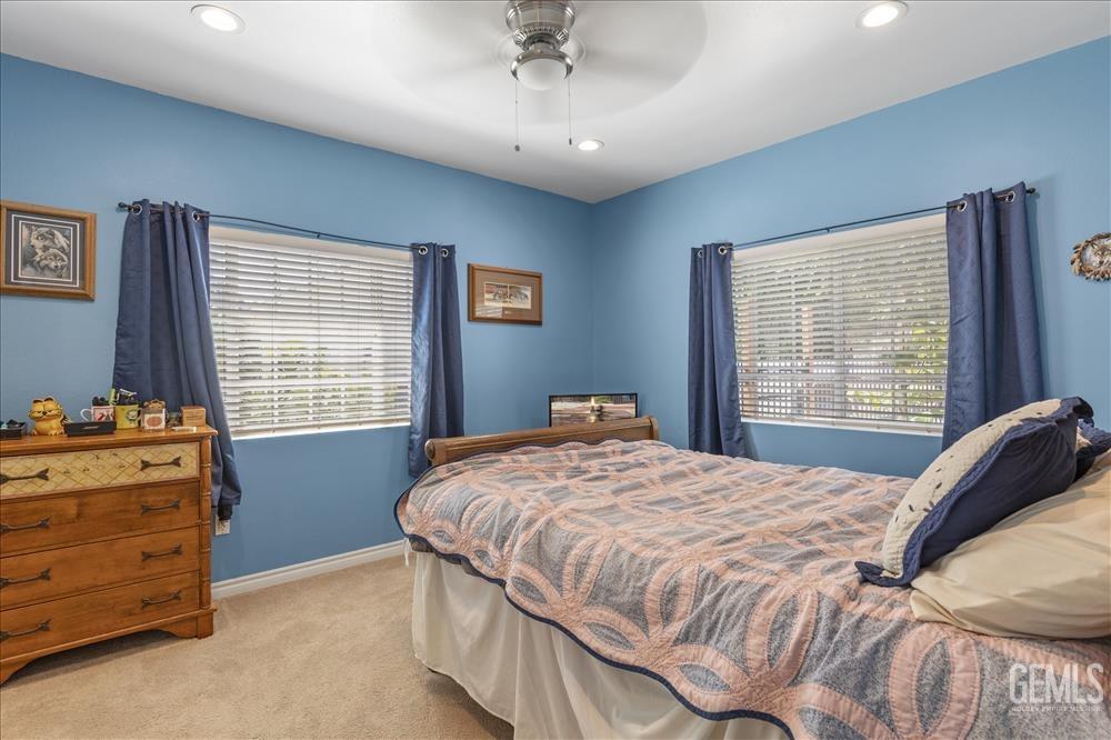 Undisclosed Address Tehachapi, CA 93561 - Photo 12 of 29 a bedroom with a bed and a window