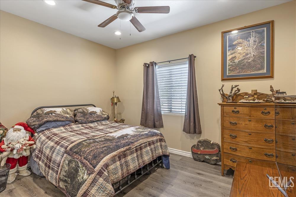 Undisclosed Address Tehachapi, CA 93561 - Photo 14 of 29 a bedroom with a bed and a dresser