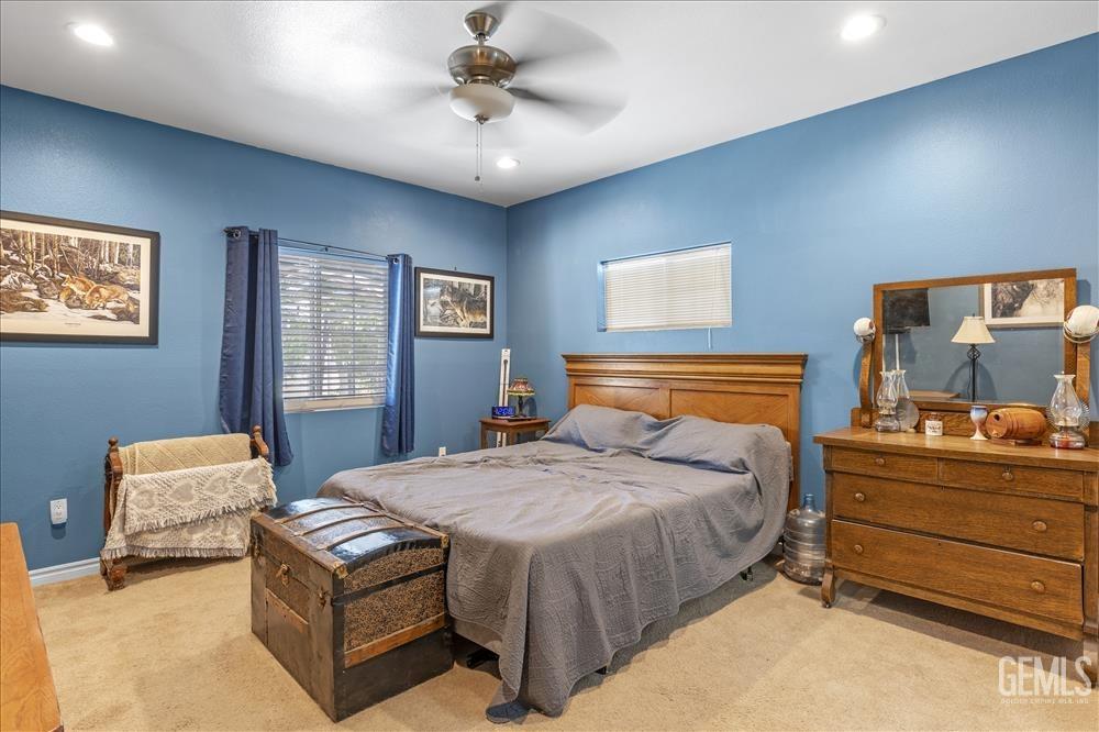 Undisclosed Address Tehachapi, CA 93561 - Photo 18 of 29 a bedroom with a bed and window