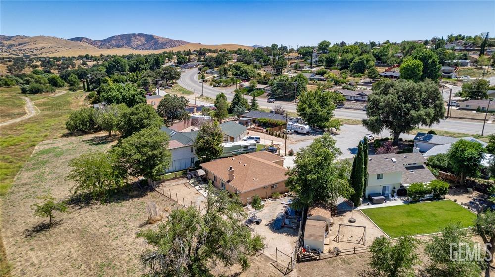 Undisclosed Address Tehachapi, CA 93561 - Photo 25 of 29 an aerial view of a house with a garden