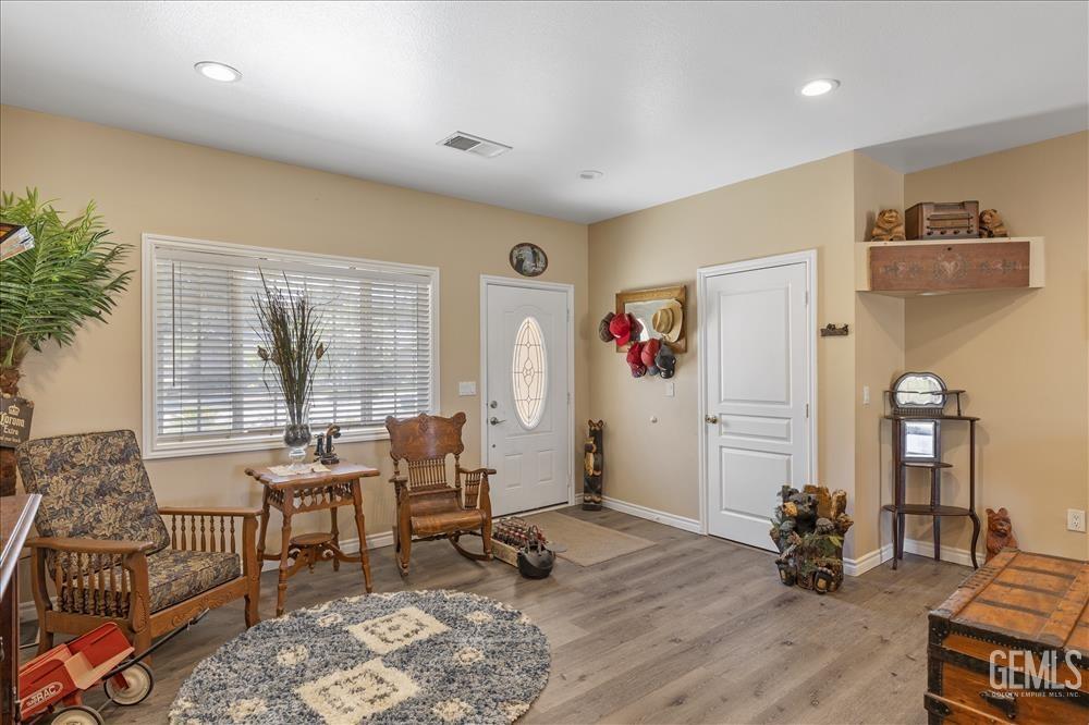 Undisclosed Address Tehachapi, CA 93561 - Photo 3 of 29 a living room with furniture and wooden floor