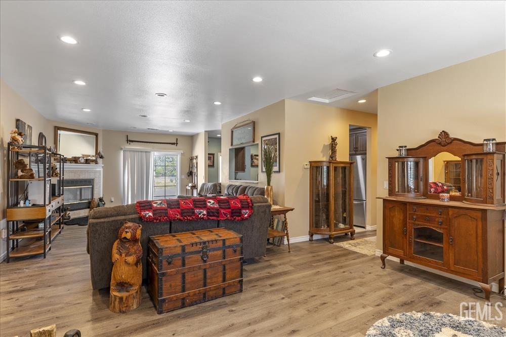 Undisclosed Address Tehachapi, CA 93561 - Photo 4 of 29 a living room with furniture and a fireplace