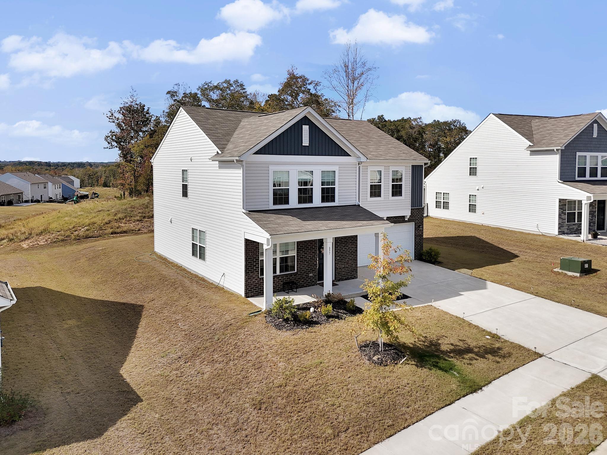 657 Mile Crk Road Edgemoor, SC 29712 - Photo 3 of 40 a view of a house with yard and sitting area