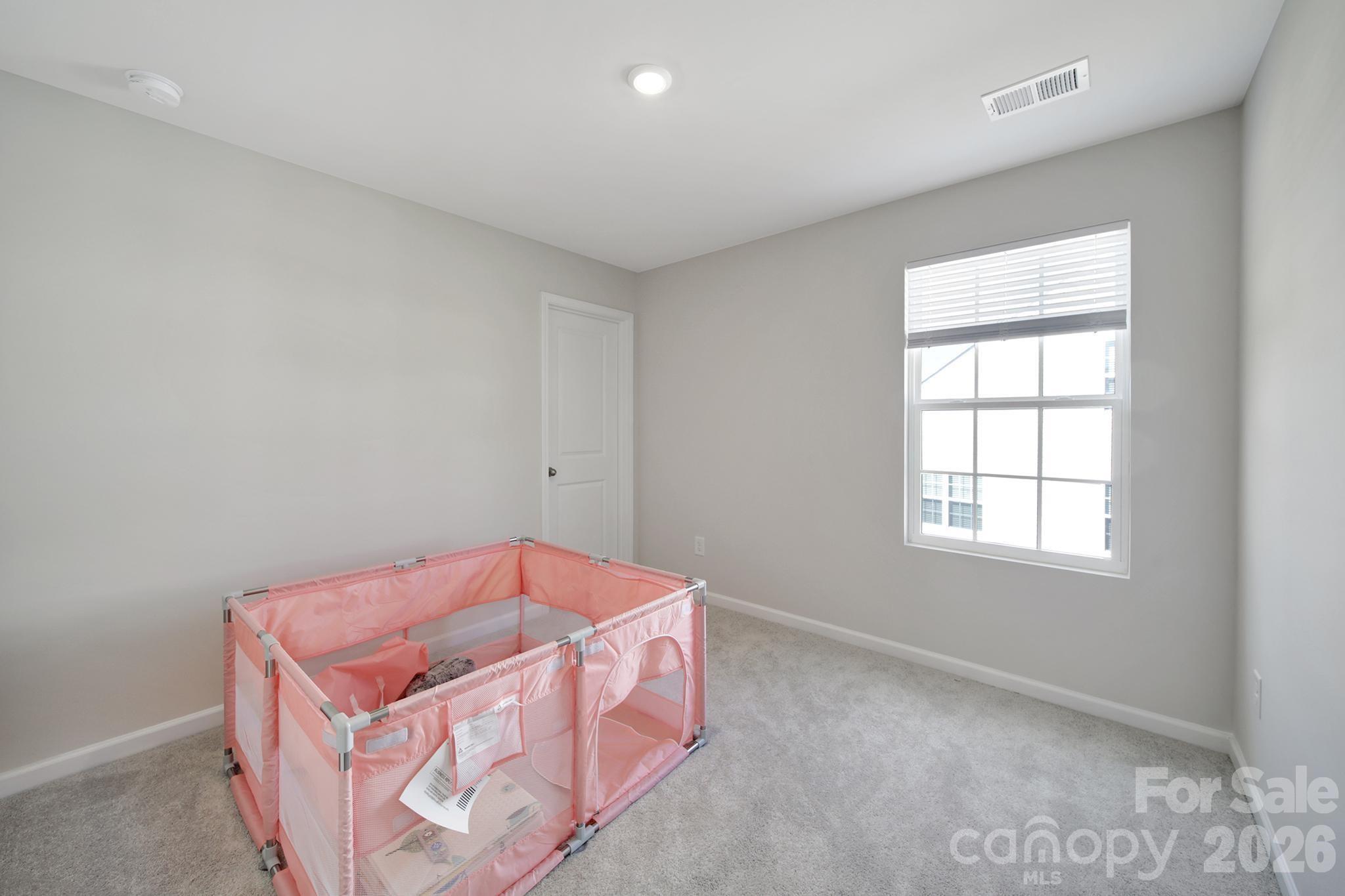657 Mile Crk Road Edgemoor, SC 29712 - Photo 31 of 40 an empty room with a window