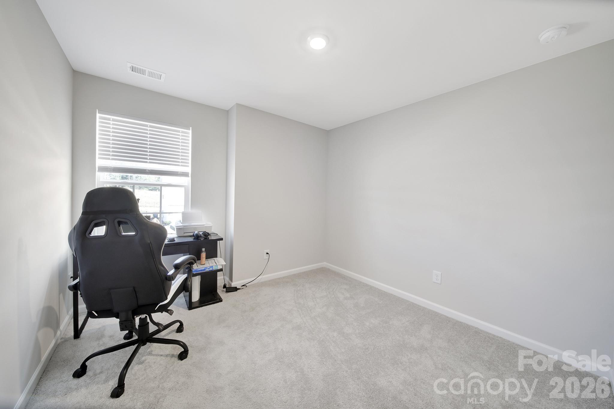 657 Mile Crk Road Edgemoor, SC 29712 - Photo 33 of 40 a view of a workspace with furniture and a window