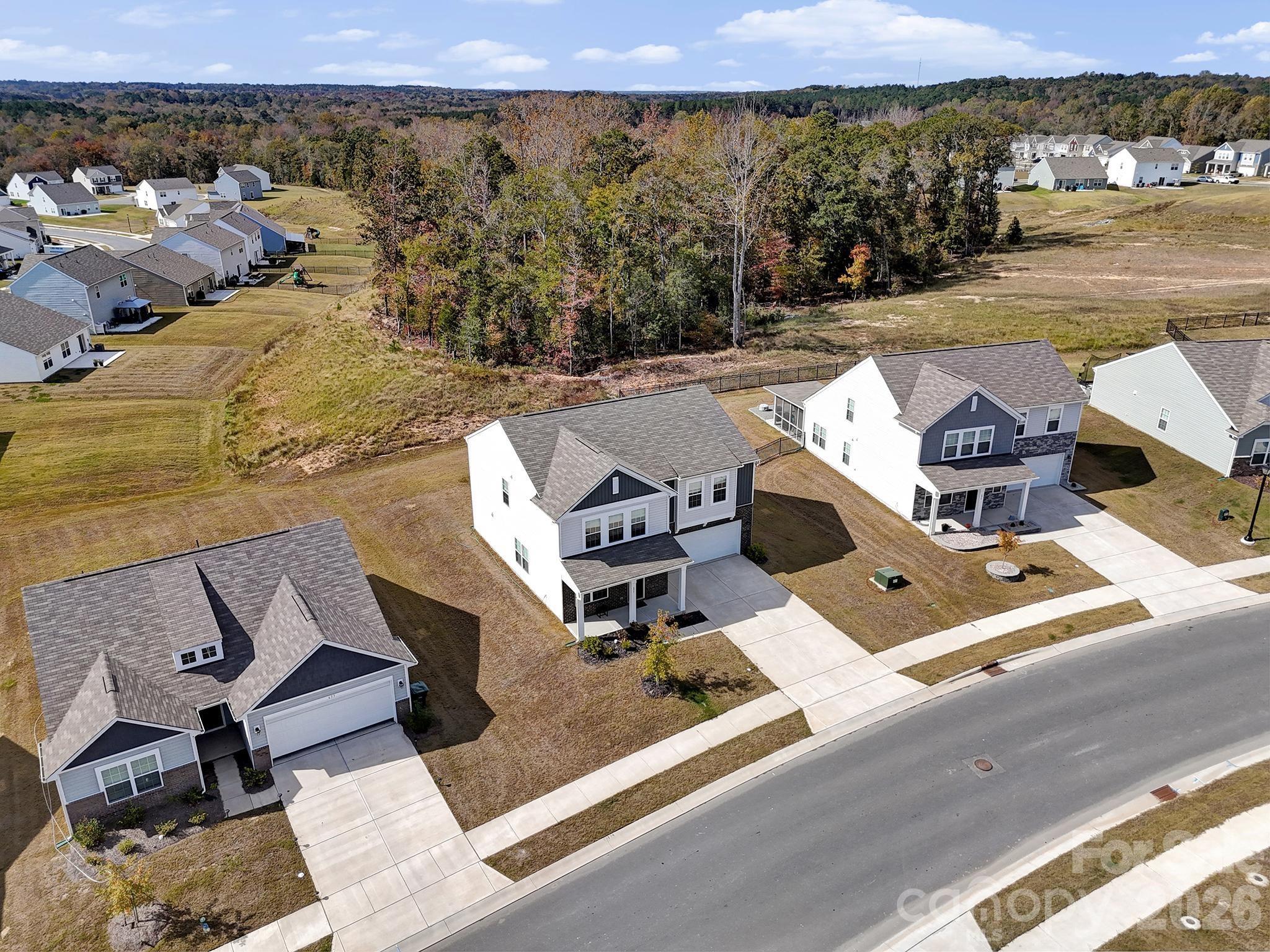 657 Mile Crk Road Edgemoor, SC 29712 - Photo 4 of 40 an aerial view of a house with a yard
