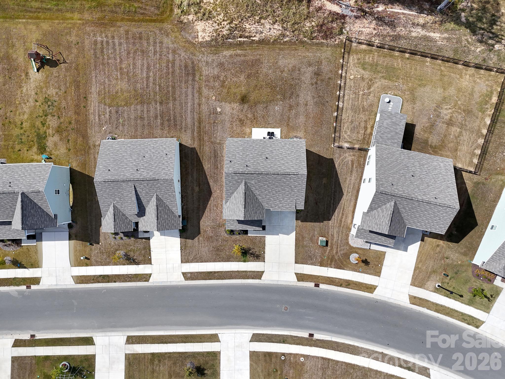 657 Mile Crk Road Edgemoor, SC 29712 - Photo 6 of 40 an aerial view of residential houses with outdoor space