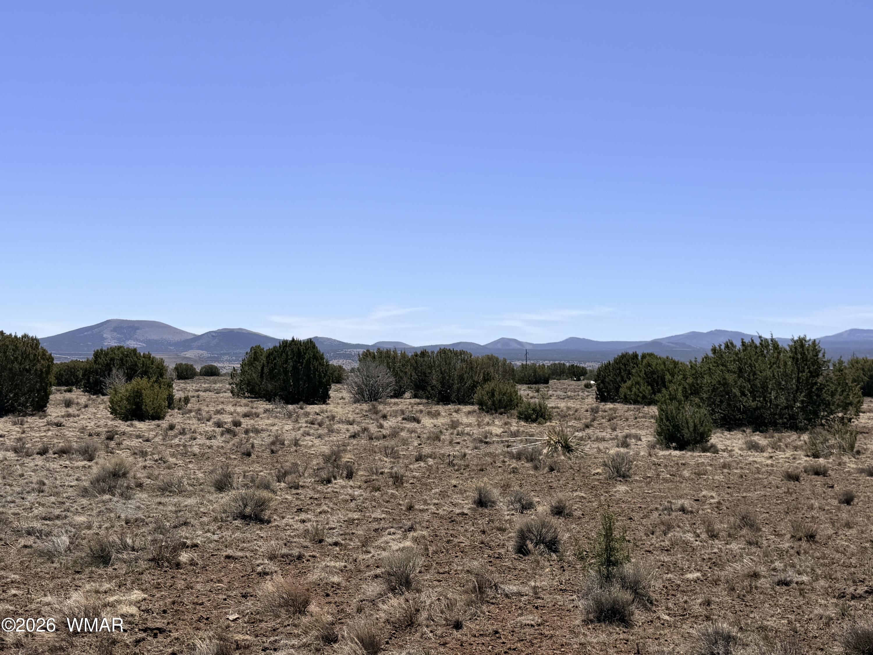 14 N3111, Unit A Vernon, AZ 85940 - Photo 3 of 14 a view of a mountain with sunset view