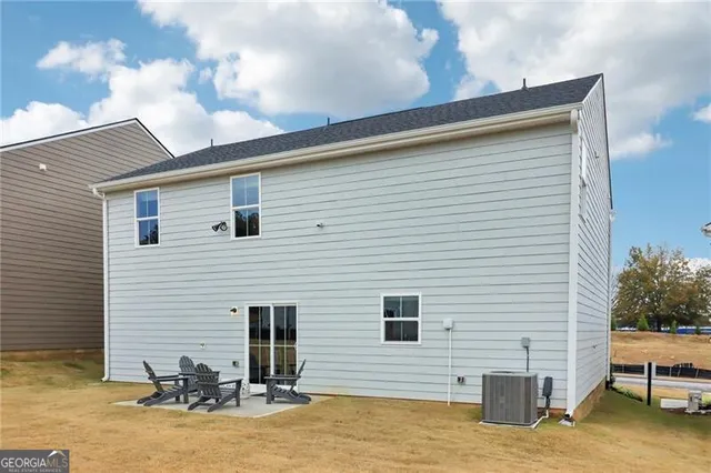 a picture of a wall with white wall with a white wall and a painting