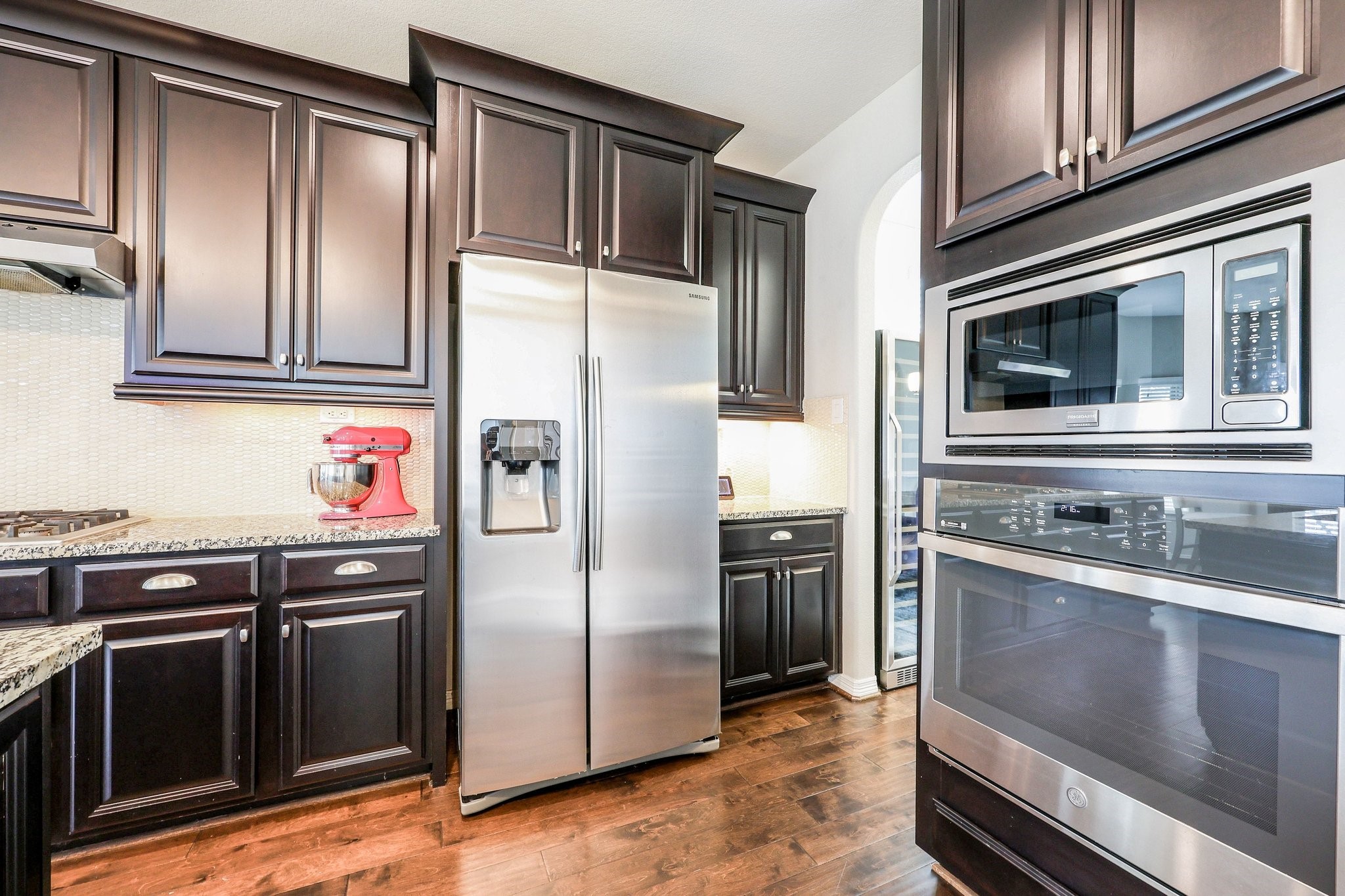 3535 Satton Ranch Lane Fulshear, TX 77441 - Photo 12 of 49 Abundance of kitchen cabinets for the family who loves to cook.