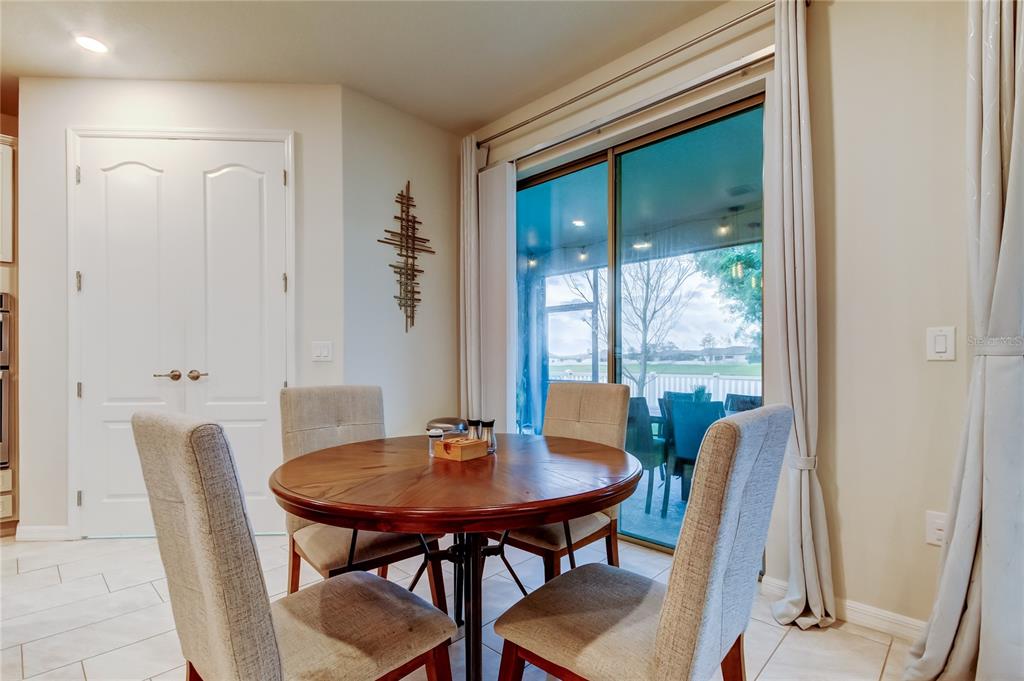 12704 Palapa Loop Spring Hill, FL 34610 - Photo 19 of 78 Kitchen eating area