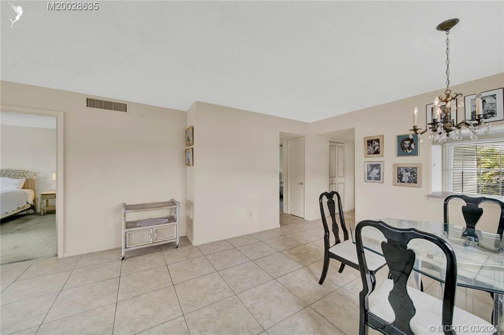 1860 Southwest Palm City Road, Unit 201 Stuart, FL 34994 - Photo 19 of 45 a view of a livingroom with furniture and lounge chair