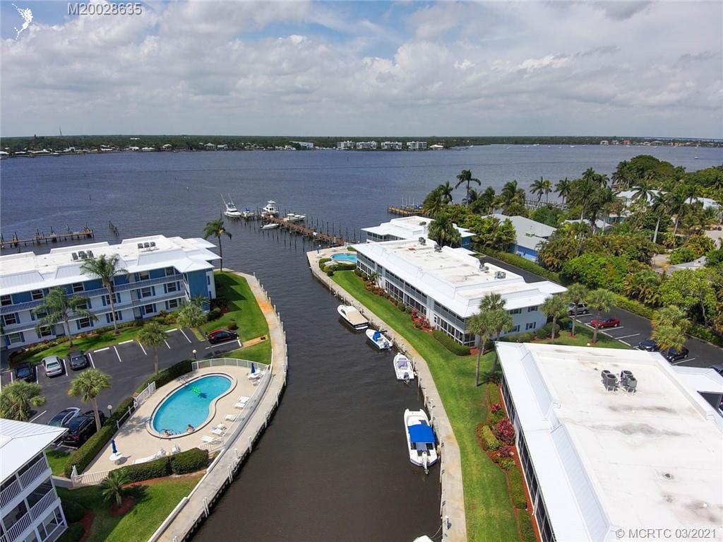 1860 Southwest Palm City Road, Unit 201 Stuart, FL 34994 - Photo 4 of 45 a picture of city view with lake view