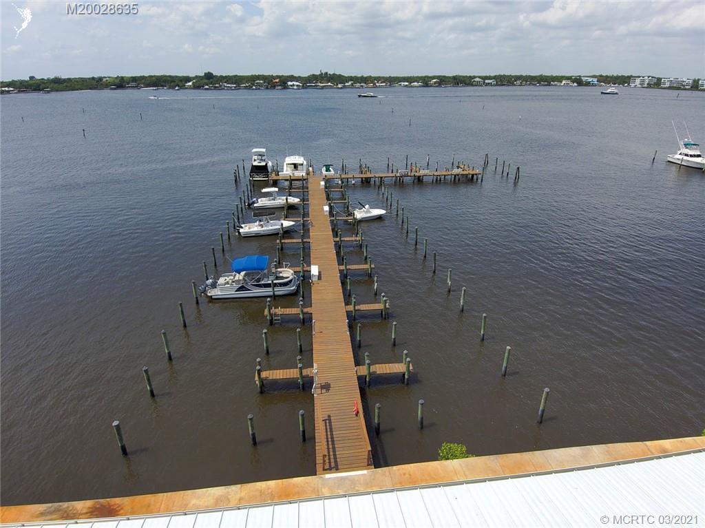 1860 Southwest Palm City Road, Unit 201 Stuart, FL 34994 - Photo 42 of 45 a view of river and staircase