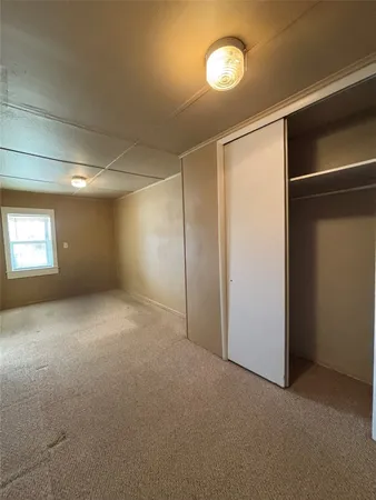 a view of empty room with windows