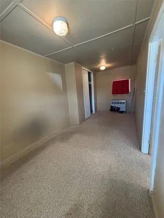 a view of empty room with windows