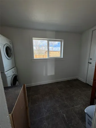 a view of workspace with wooden floor