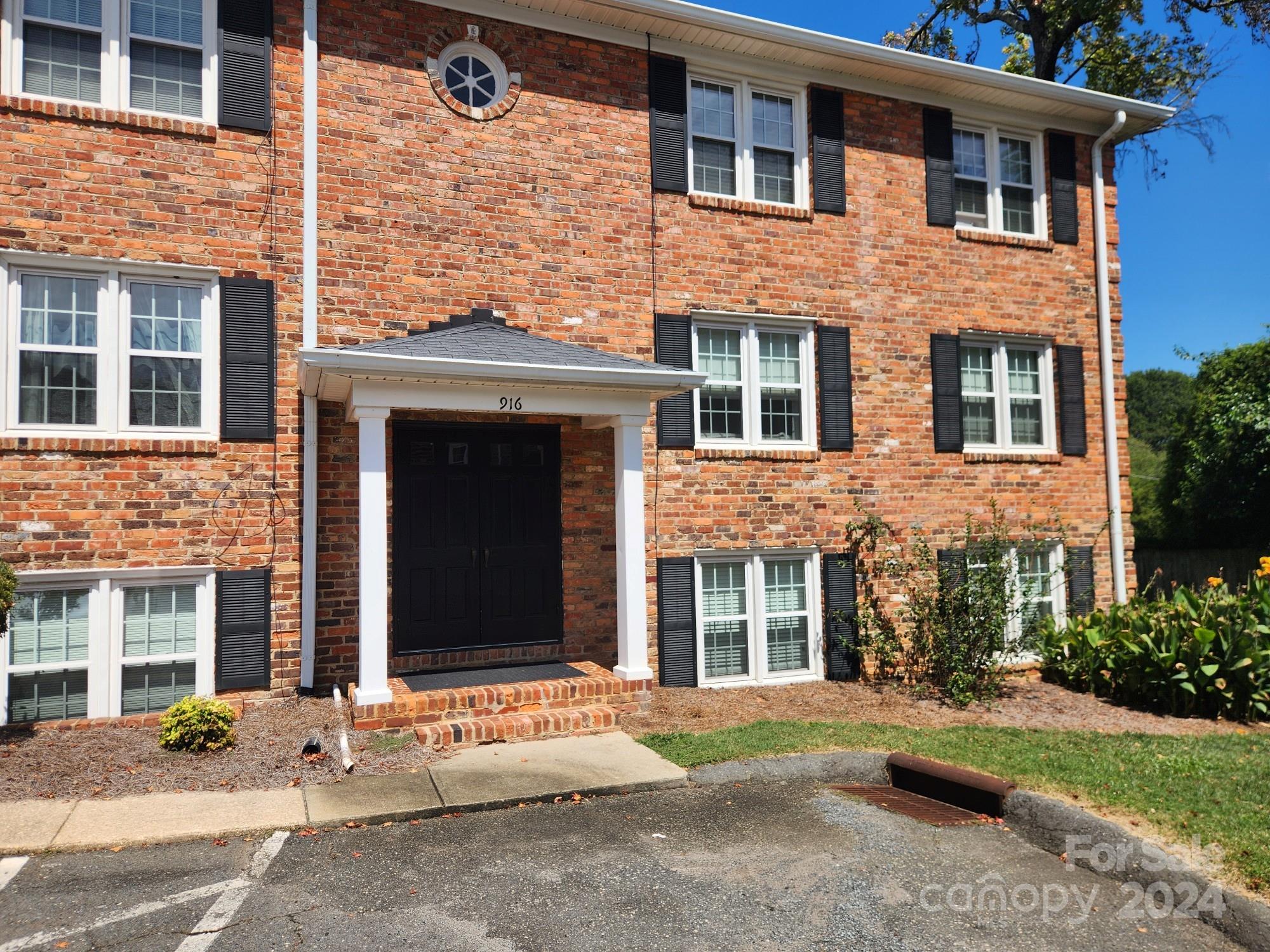 910 McAlway Road, Unit C Charlotte, NC 28211 - Photo 1 of 10 front view of a brick building