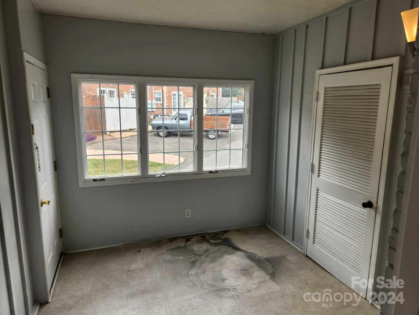910 McAlway Road, Unit C Charlotte, NC 28211 - Photo 7 of 10 a view of an empty room with a window
