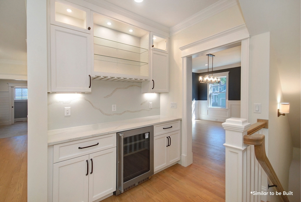 54 Maple Street Concord, MA 01742 - Photo 4 of 27 a view of a kitchen cabinets and wooden floor